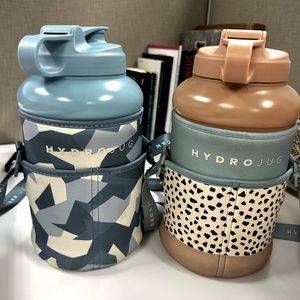 Two HYDROJUG with sleeves. One is the limited edition Hazlenut.